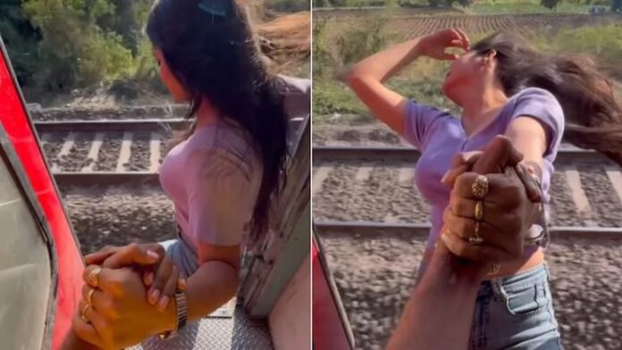 चलती ट्रेन से लटककर LOVE रील बना रही थी लड़की,यूजर्स बोले`बस एक खंभा और खेल खत्म’